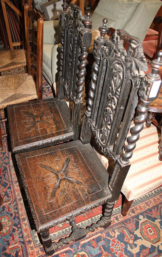 Pair high back carved oak chairs